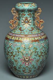 A FAMILLE ROSE VASE QIANLONG MARK AND PERIOD: A FAMILLE ROSE VASE QIANLONG MARK AND PERIOD. Dimensions: 11 x 7 in. Provenance: From the collection of Charles George(1898-1983). Manager of Sir Victor Sassoon's Empire in China, Mr Charles George an