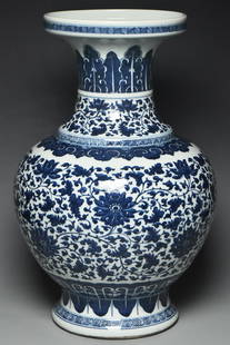 A LARGE BLUE WHITE VASE QIANLONG MARK AND PERIOD: A LARGE BLUE AND WHITE VASE QIANLONG MARK AND PERIOD. Dimensions: 18 1/4 x 12 1/4 in. Provenance: From the collection of Charles George(1898-1983). Manager of Sir Victor Sassoon's Empire in China, Mr