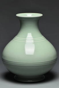 A GUAN TYPE VASE QIANLONG MARK AND PERIOD: A GUAN TYPE VASE QIANLONG MARK AND PERIOD. Dimensions: 8 1/4 x 7 in. Provenance: From the collection of Charles George(1898-1983). Manager of Sir Victor Sassoon's Empire in China, Mr Charles George