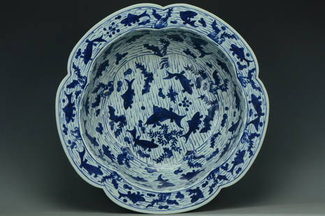 A LARGE FISH LOBED BASIN WANLI MARK AND PERIOD: A LARGE MING DYNASTY FISH LOBED BASIN WANLI MARK AND PERIOD. Dimensions: 14 3/4 x 4 in. Provenance: From the collection of Charles George(1898-1983). Manager of Sir Victor Sassoon's Empire in China,