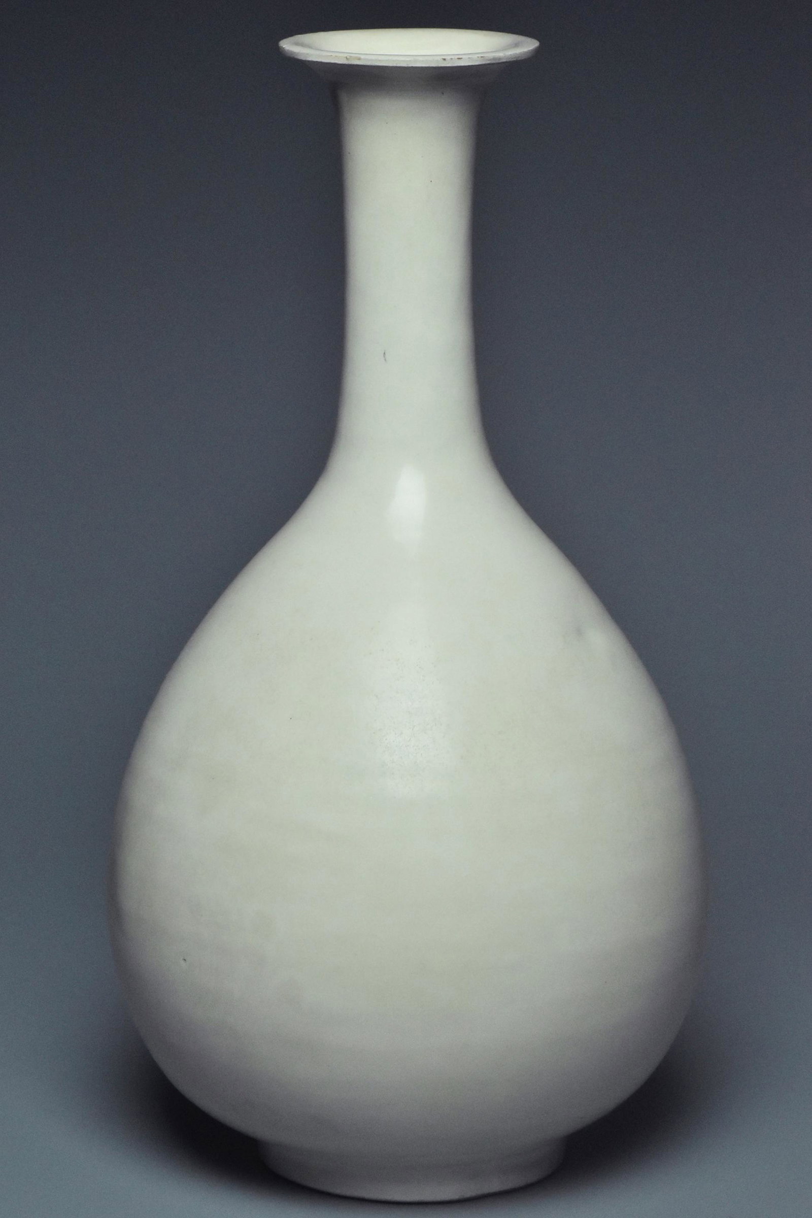 A SONG DYNASTY WHITE GLAZED YUHUCHUNPING VASE: A SONG DYNASTY WHITE GLAZED YUHUCHUNPING VASE. Dimensions: 11 1/2 x 6 in. Provenance: From the collection of Charles George(1898-1983). Manager of Sir Victor Sassoon's Empire in China, Mr Charles Geor