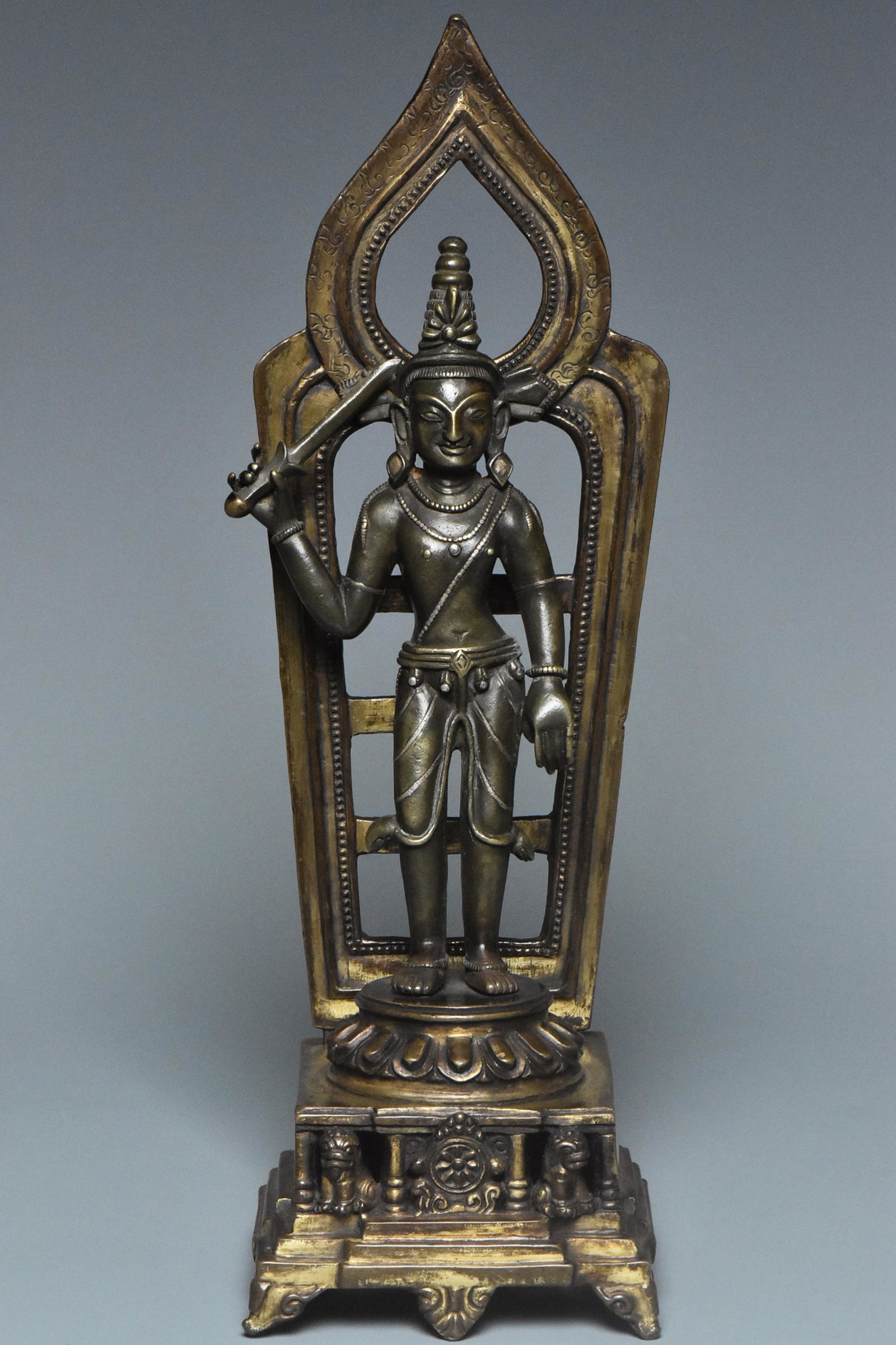 A YUAN DYNASTY SILVER-INLAID GILT BRONZE MANJUSHRI (1 of 15)