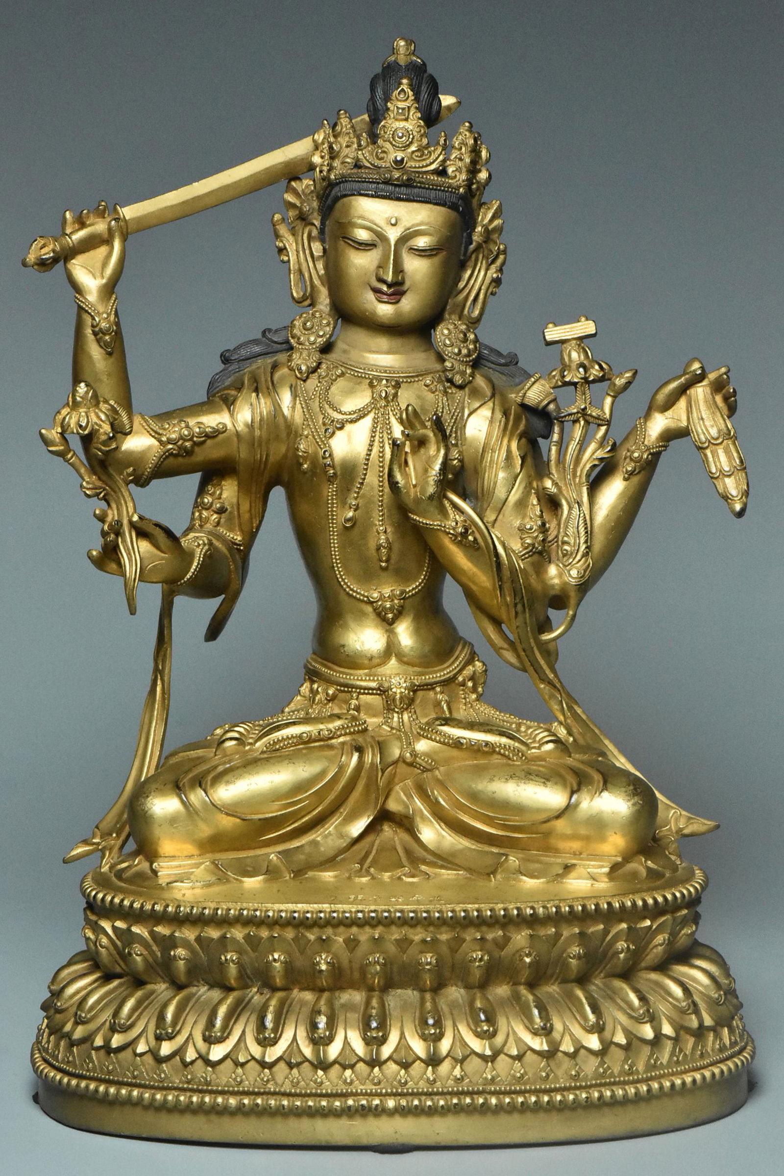 A GILT BRONZE MANJUSHRI YONGLE MARK AND PERIOD (1 of 16)
