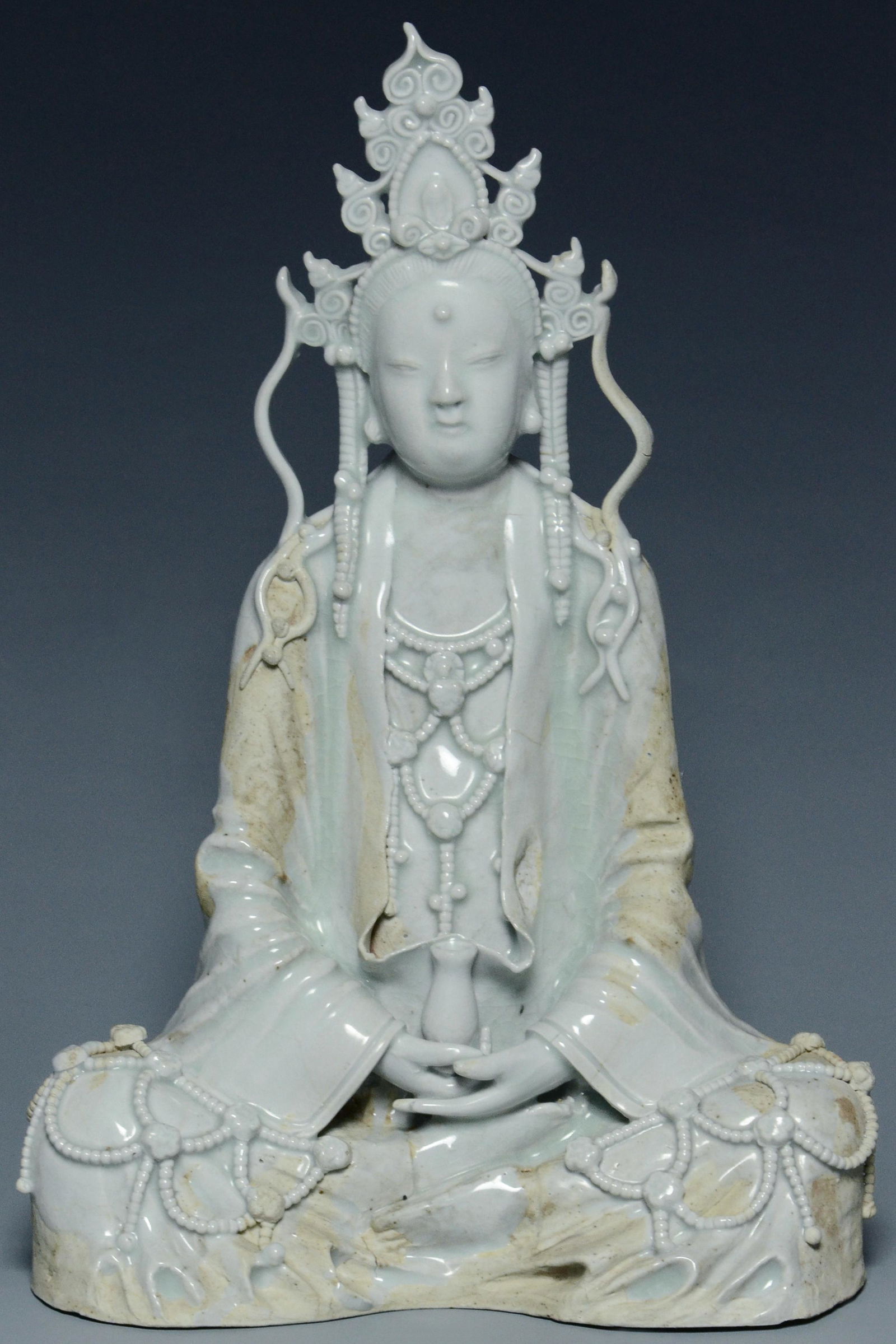 A SONG DYNASTY QINGBAI SEATED FIGURE OF GUANYIN (1 of 15)