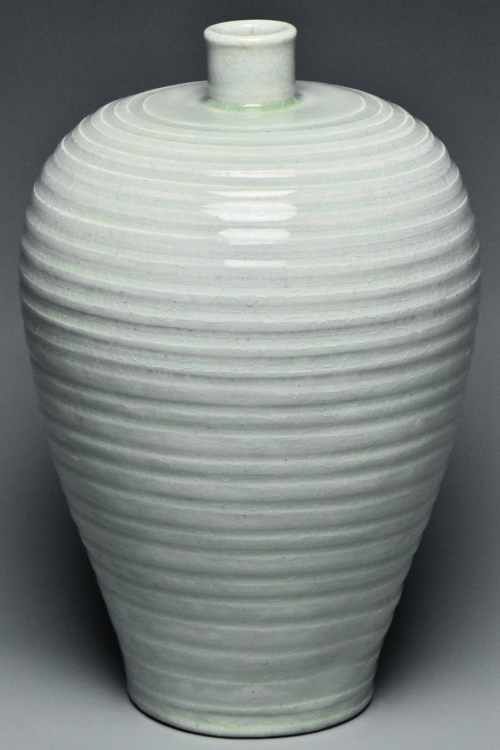 A SONG DYNASTY CARVED QINGBAI MEIPING VASE (1 of 16)