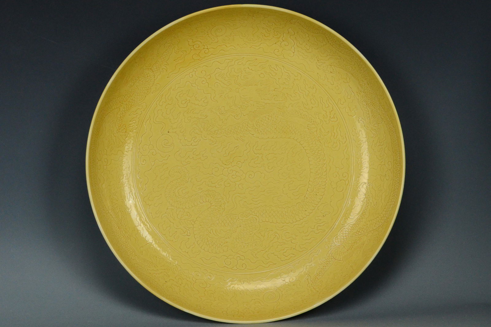 A LARGE YELLOW DRAGON DISH KANGXI MARK AND PERIOD (1 of 11)