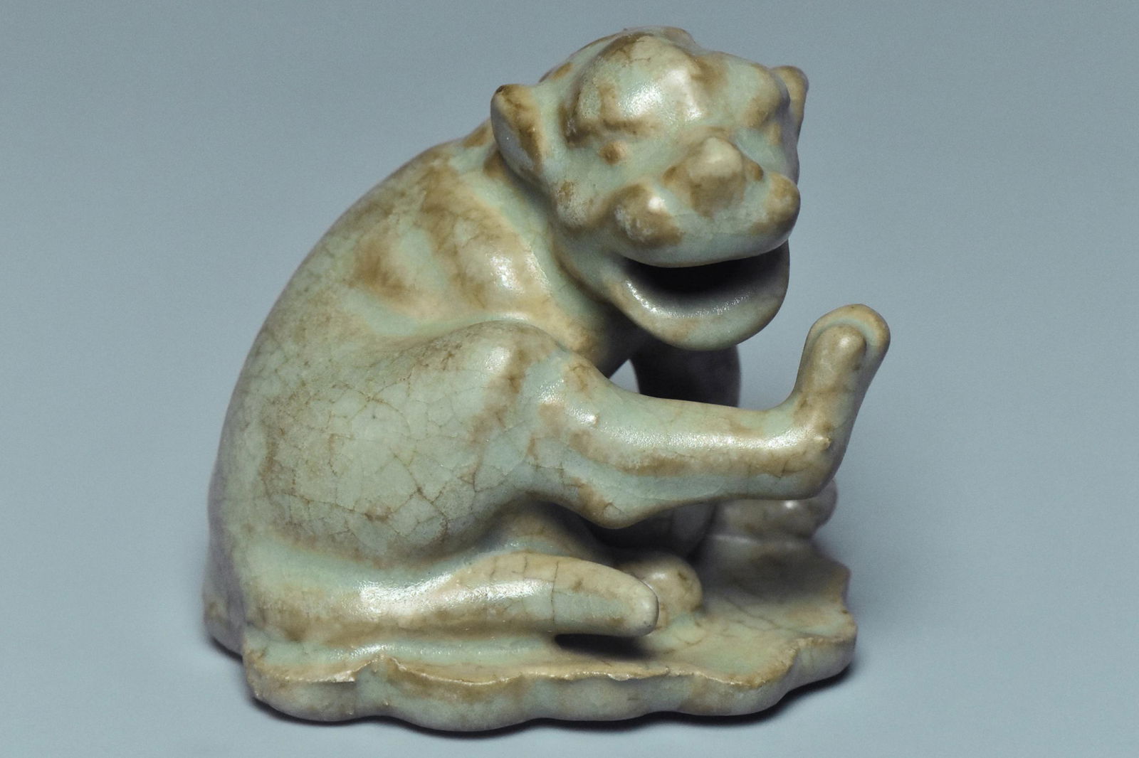 A RUYAO FIGURE OF A LION (1 of 10)