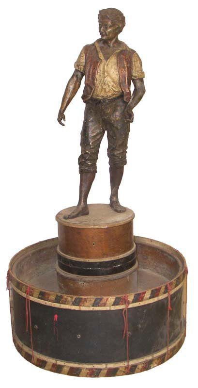 Foyer planter w/boy standing on drum 53"x32": Rare and unusual foyer planter with polychrome statue of boy standing on copper lined drum - 58"h x 32" diameter - This is a two-day auction we only have one day on ebay live. We also have absentee &