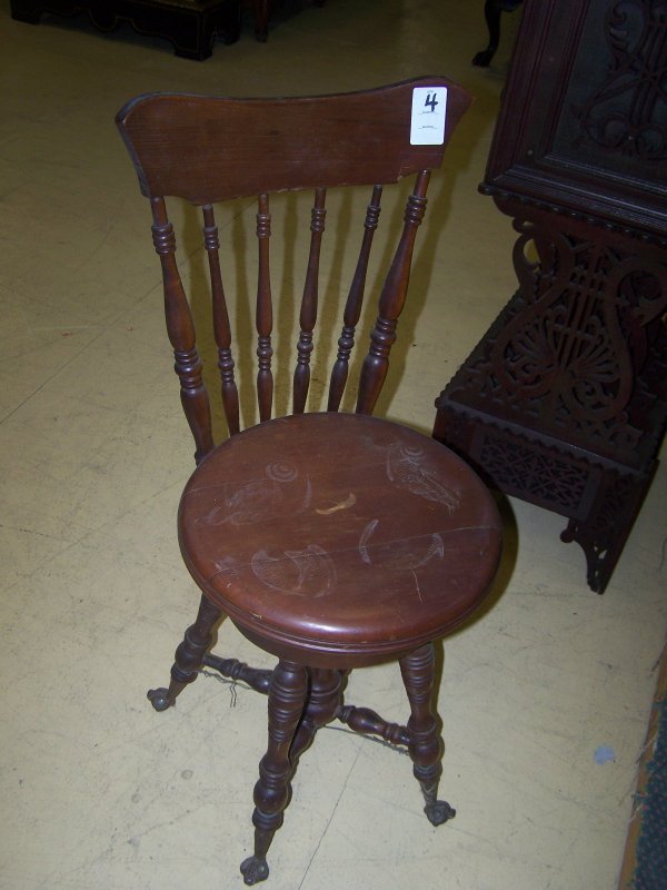 Walnut highback piano stool with twist legs,ball & c