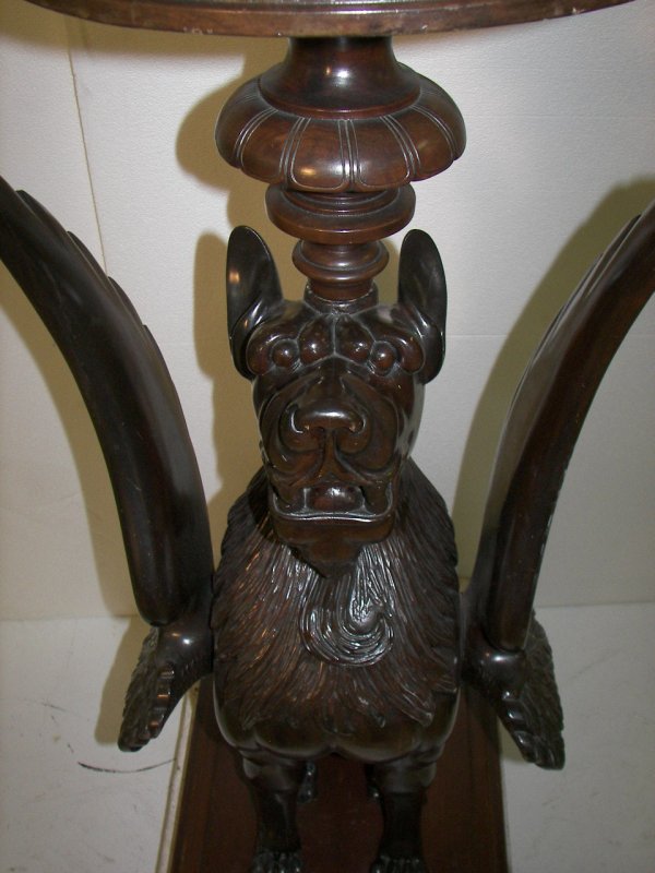 Monumental 19th C. carved walnut winged griffin ped