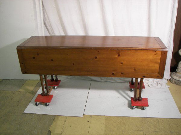 Ca. 1920 bench made walnut and pine banquette tabl: Ca. 1920 bench made walnut and pine banquette table with banded inlay,drop sides and Queen Ann legs attrib. to Baker