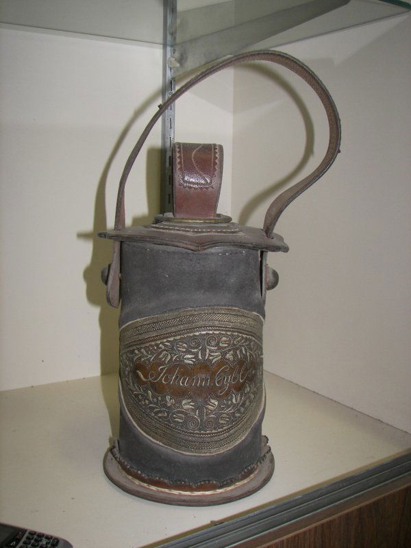 Unusual hand tooled leather lunch bucket: Unusual hand tooled leather lunch bucket