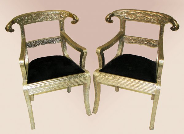Pr. Moroccan silver decorated carved arm chairs: Pr. of antique Moroccan silver decorated arm chairs with ram heads34"h x 25"w