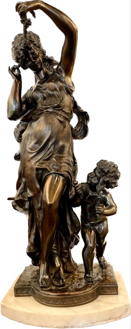 Antique Bronze of Venus Playing with Cupid by Unknown Artist: Artist: Unknown Artist Subject: Woman playing with child Medium: Bronze statue Date: 1950's Size: Height: 20.25" Width: 8.5" Depth 6" Provenance: Sigv