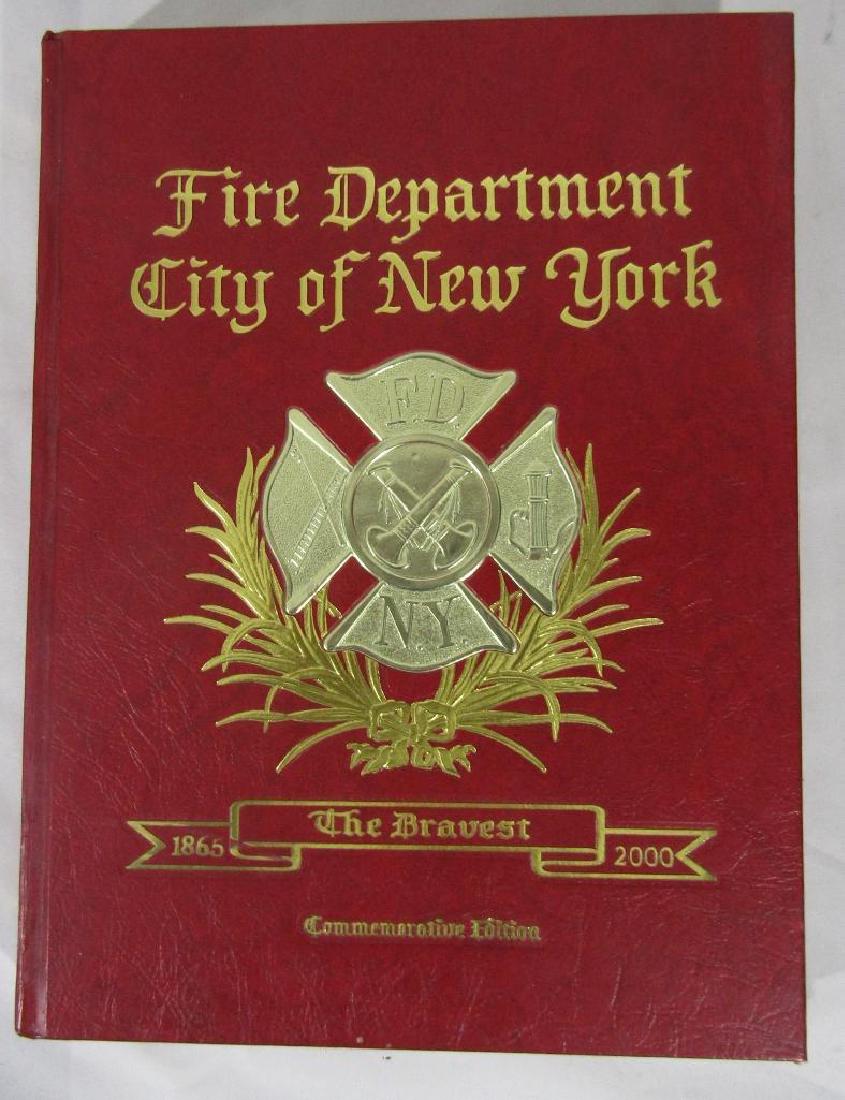 125th Anniversary of F.D.N.Y Badge & Book 1865 - 1990: F.D.N.Y. Metropolitan Fire Dept 125th Anniversary 1865-1990. FDNY Badge, with a corresponding FDNY 125th Fire Dep. City of New York commemorative Edition Book. Both piece are very good condition,