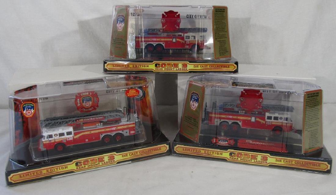 3  Code 3 Collectibles Rear Mount Ladder Trucks (1 of 1)