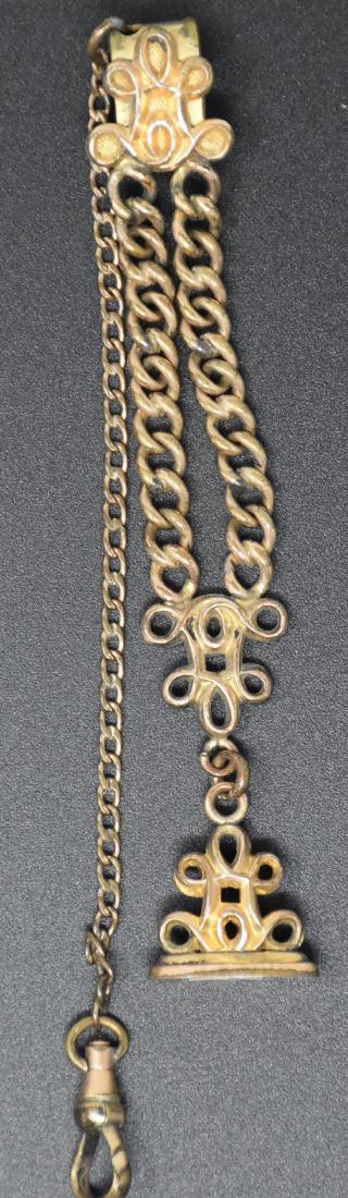 1 Gold Flled Watch Chain w Fob: 1 Gold Flled Watch Chain w Fob Condition reports are provided upon request.