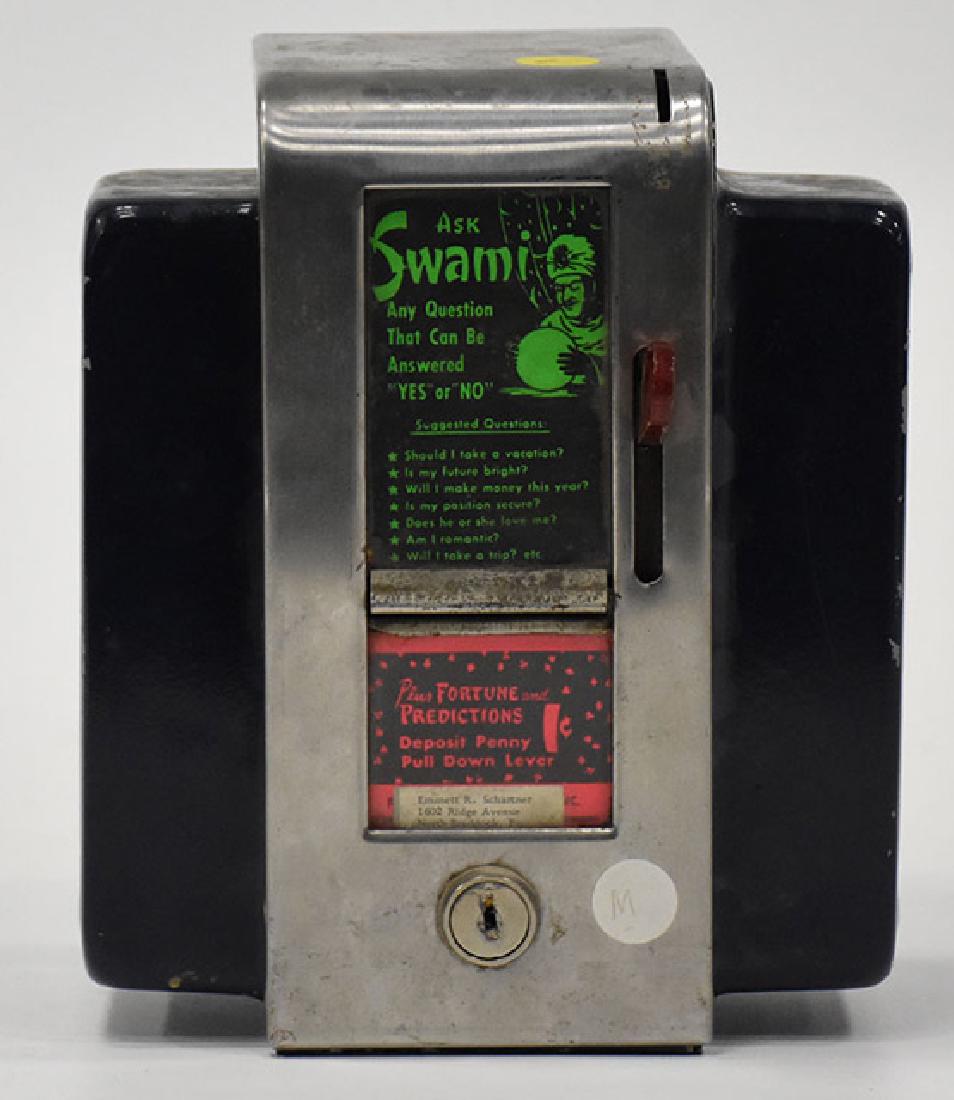 Coin operated fortune teller napkin dispenser: Coin operated fortune teller napkin dispenser Measures Apx. 9" tall and 4" wide. Condition reports are provided upon request.
