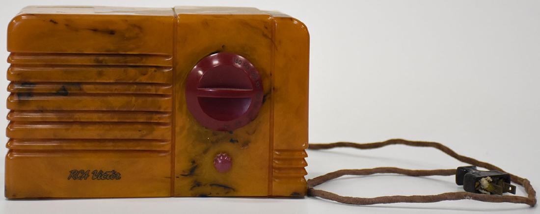 RCA 9-sx little nipper catalin radio: catalin radio Measures Apx. 6" tall and 8" wide.Condition reports are provided upon request.Im adding a picture on live auctioneers. The inside appears complete, the back cardboard is missing. has the