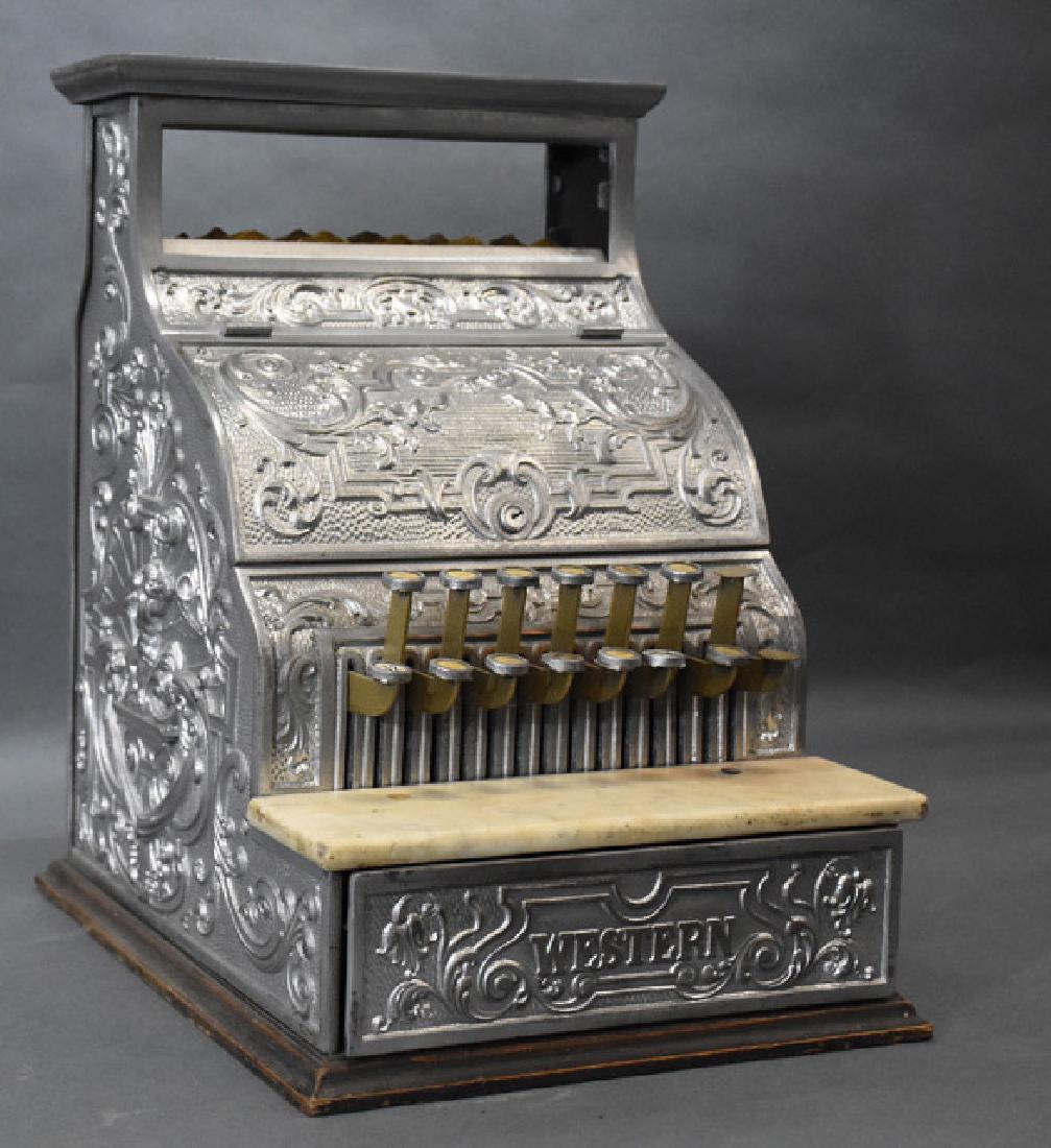 Burdick Corbin Western model nickle cash register: cash reg Measures Apx. 18" tall and 15" wide. Condition reports are provided upon request.It could be functional but does not work smoothly, the works would need cleaned and restored to operate smooth