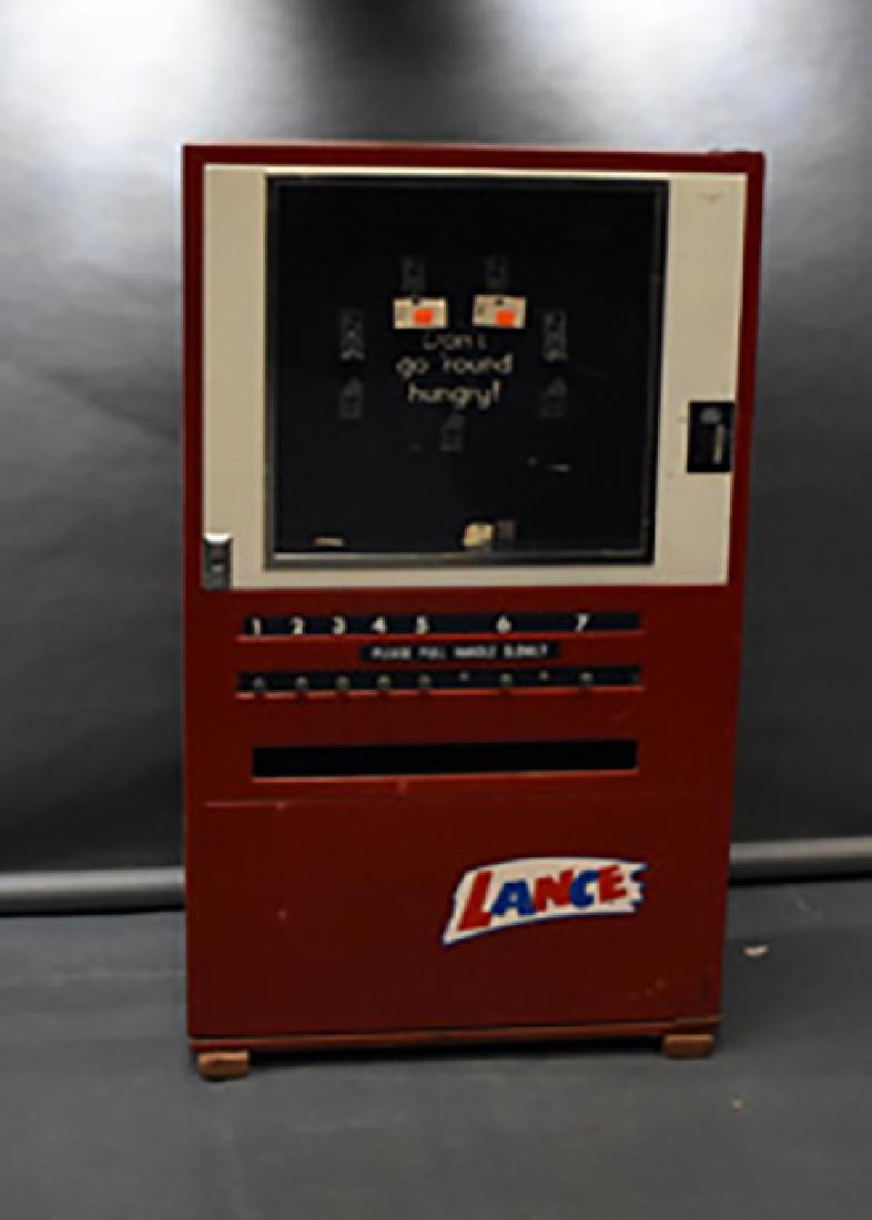 Lance vending machine: Measures Apx. 64" tall and 38" wide Condition reports are provided upon request.