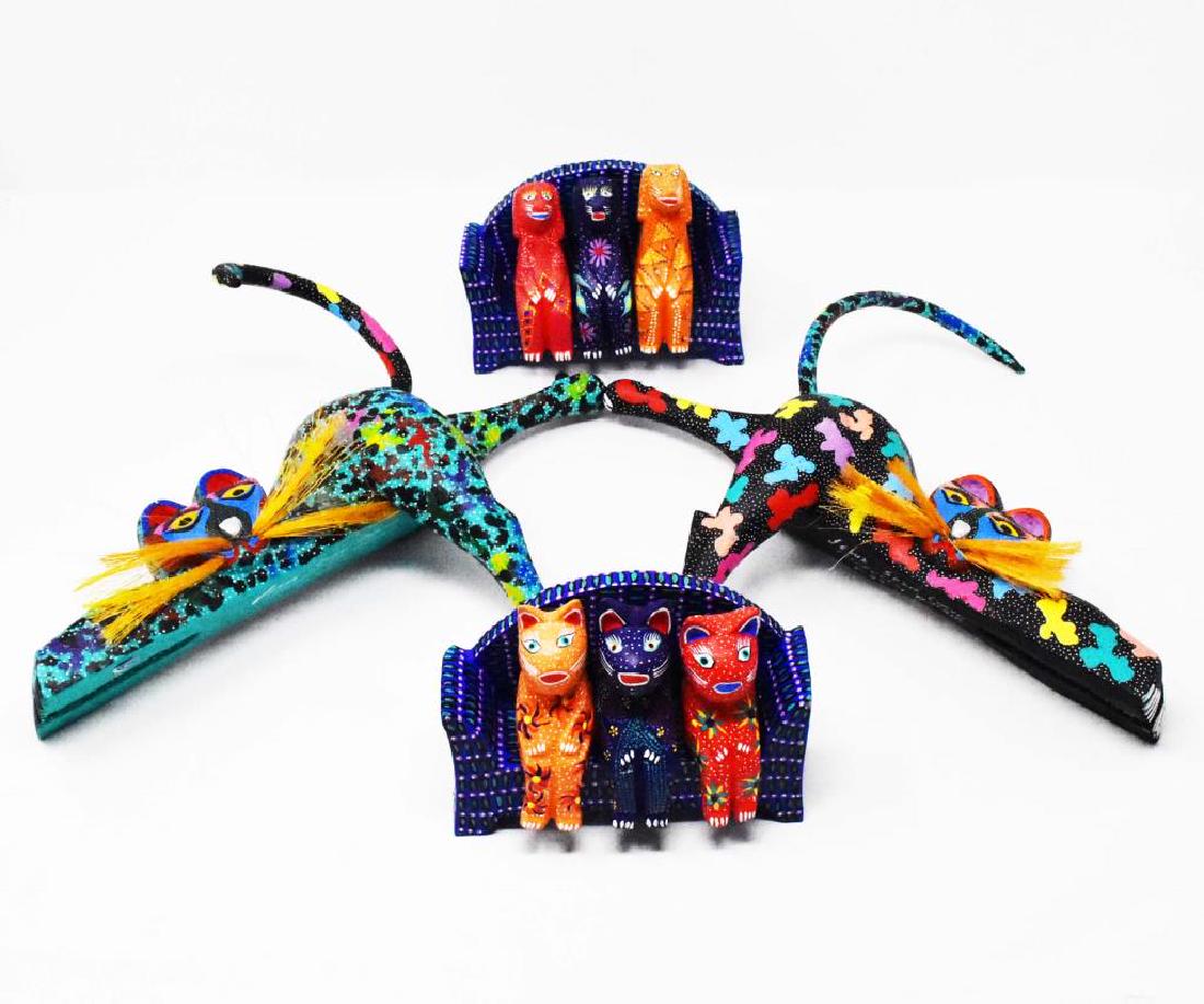 10 pieces of Oaxaca Mexico animals/benches: 10 pieces of carved wood & paint decorated Oaxaca Mexico animal figures, 2 mantel/ shelf cats 12"L & 2 benches w/ 3 dogs & 3 cats