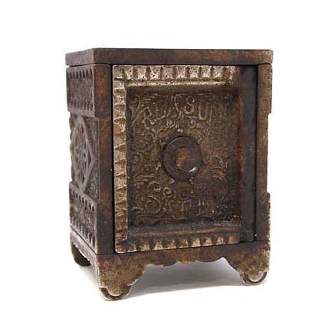 Cast Iron Treasure Safe Still Penny Bank: Cast Iron Treasure Safe Still Penny Bank. Measures 5" tall. Packaging, Insurance, Handling, Shipping is done in house and is 20.00 for this item in the continental U.S. Or you are welcome to pick up i