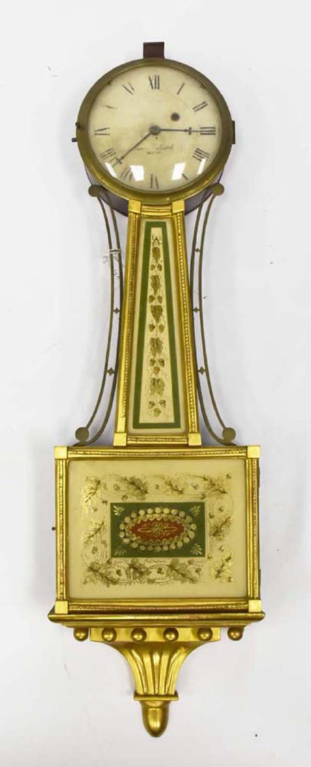 Aaron Willard Gold Gilded Banjo Clock: Aaron Willard Gold Gilded Banjo Clock. Measures 37" tall. Packaging, Insurance, Handling, Shipping is done in house and is 130.00 for this item in the continental U.S. Or you are welcome to pick up in