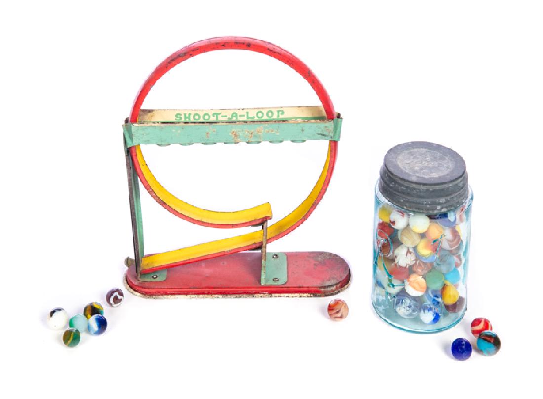 Jar of Marbles with Shoot a Loop Toy: Excellent condition with no damage or repairs. Please Email or call for a detailed condition report. The absence of a condition statement does not imply that the lot is in perfect condition or complet