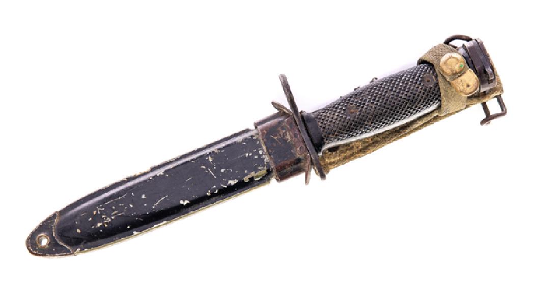 WWII Combat Knife: Good condition with normal wear. Please Email or call for a detailed condition report. The absence of a condition statement does not imply that the lot is in perfect condition or completely free from