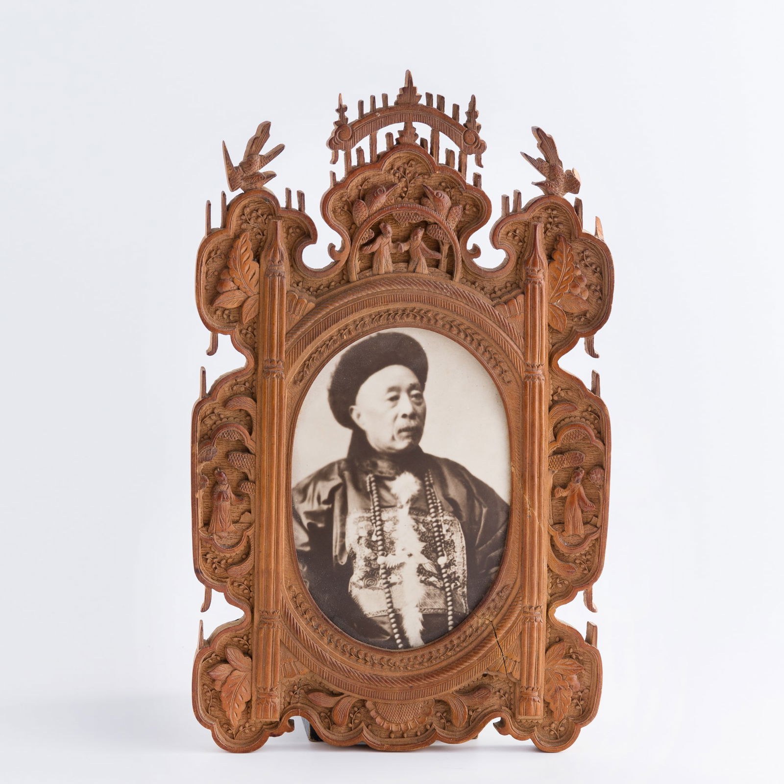 A Chinese sandalwood photo frame, late 19th century: Size: H: 12, W: 7 3/8 in. (H: 30.48, W: 18.73 cm.). Description: A Chinese sandalwood photo frame, late 19th century. Tri-State area in house truck delivery available. In house shipping with UPS will