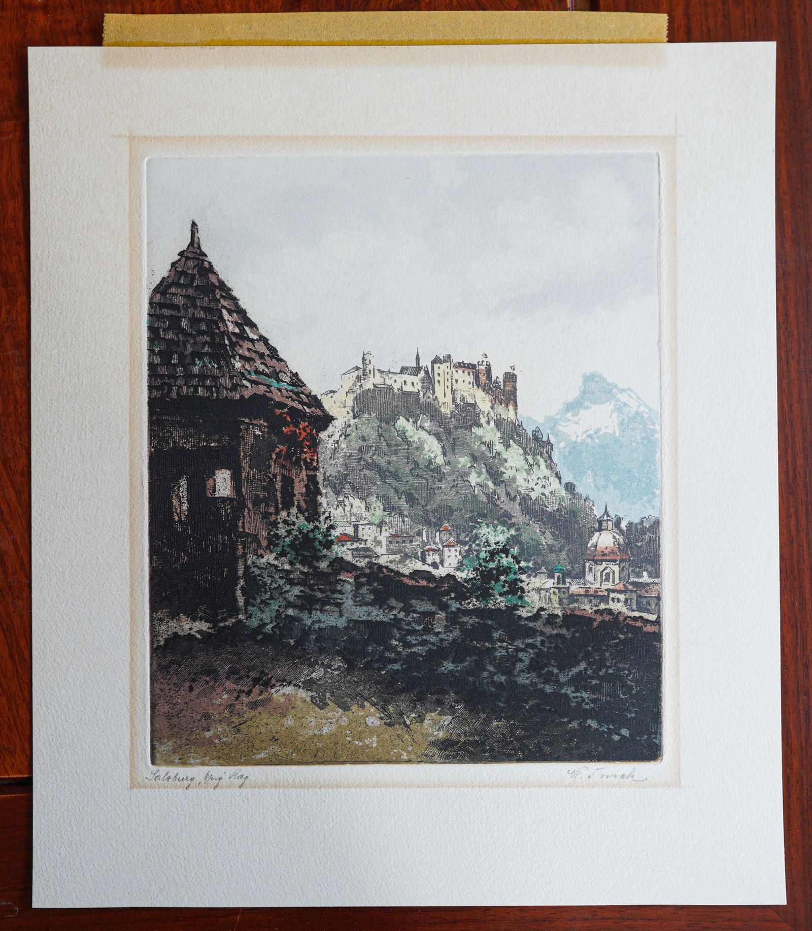 Hand-colored etching "Salzburg": Hand-colored etching "View of Salzburg, Austria", original work by the Austrian artist Karl Tucek (1889-1952). Overall size: 12" x 11". In-House shipping costs around $15 (Must choose "buyer-arranged