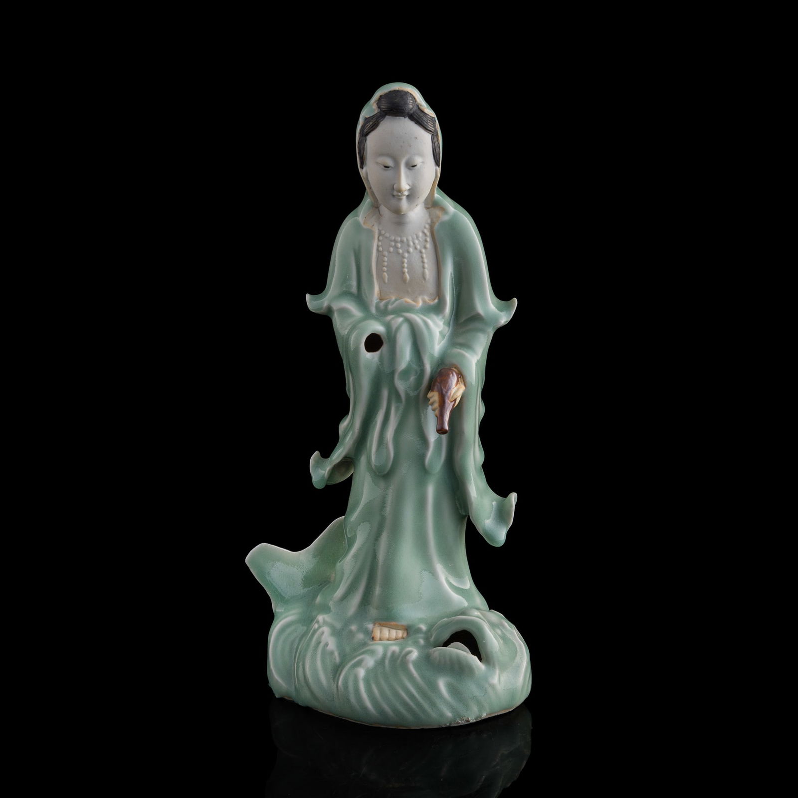 A Chinese Longquan-style Guanyin, 19th century: Size: H: 13, W: 6 1/8, D: 4 1/4 in. Description: A Chinese Longquan-style Guanyin, 19th century. Tri-State area in house truck delivery available. In house shipping with UPS will cost around $50-$80.