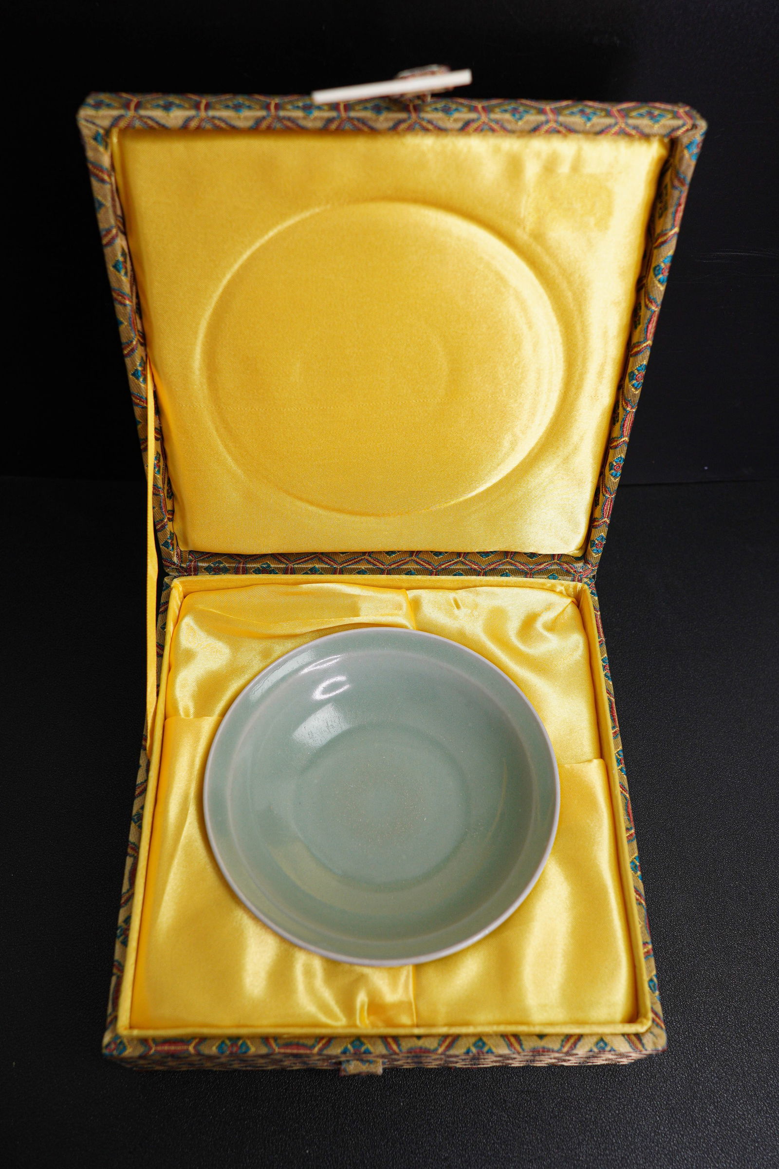 A CHINESE LONGQUAN CELADON GLAZED BOWL, SOUTHERN SONG DYNASTY (1127-1279): Size: 5" x 5" x 2" (Dish), 7" x 7" x 3" (With box). Description: With fitted box. Tri-State area in house truck delivery available. In house shipping with UPS will cost around $20-$30.