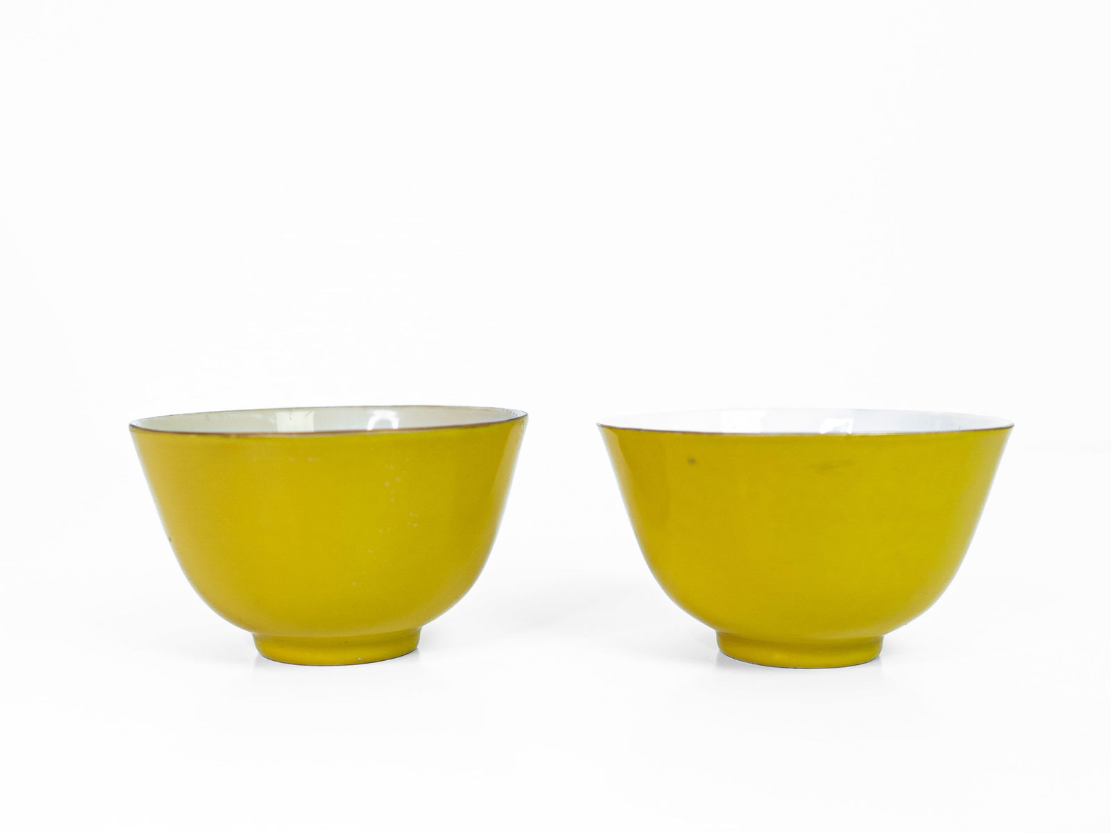 A pair of Chinese monochrome yellow-glazed cups, 19th century, Yongzheng marks (1 of 6)