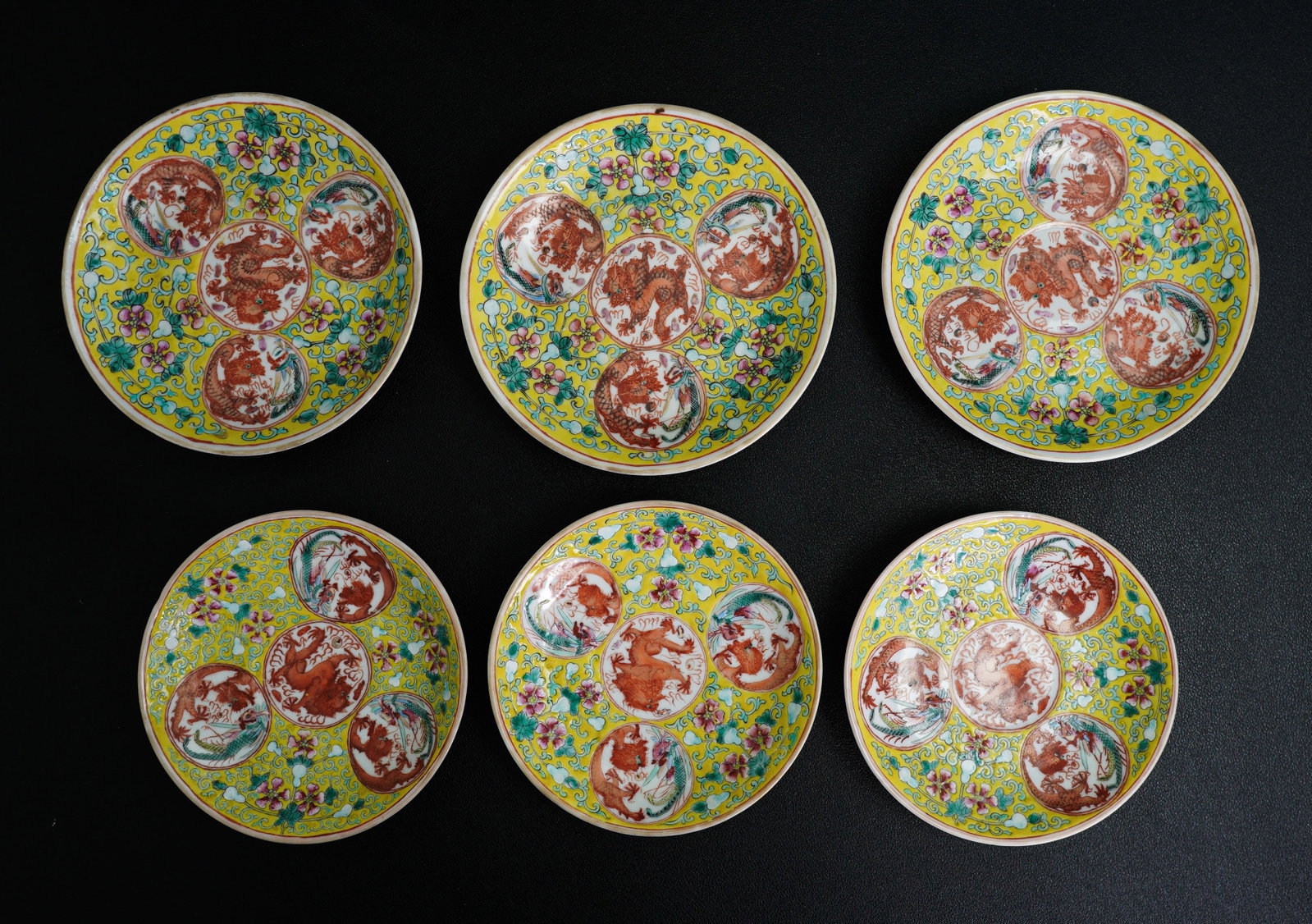 Group of 6 Chinese yellow-ground famille rose plates, Guangxu period, Qing dynasty: Size: 5" dia (3 plates), 3" dia (3 plates). Description: A group of 6 Chinese yellow-ground famille rose tea set. Guangxu period, Qing dynasty. Tri-State area in house truck delivery available. In