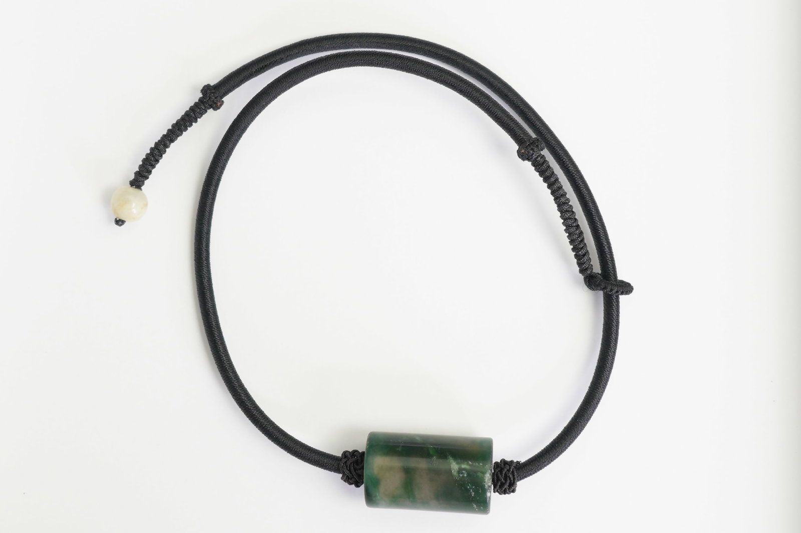 A CHINESE GREEN JADE PENDANT (1 of 6)