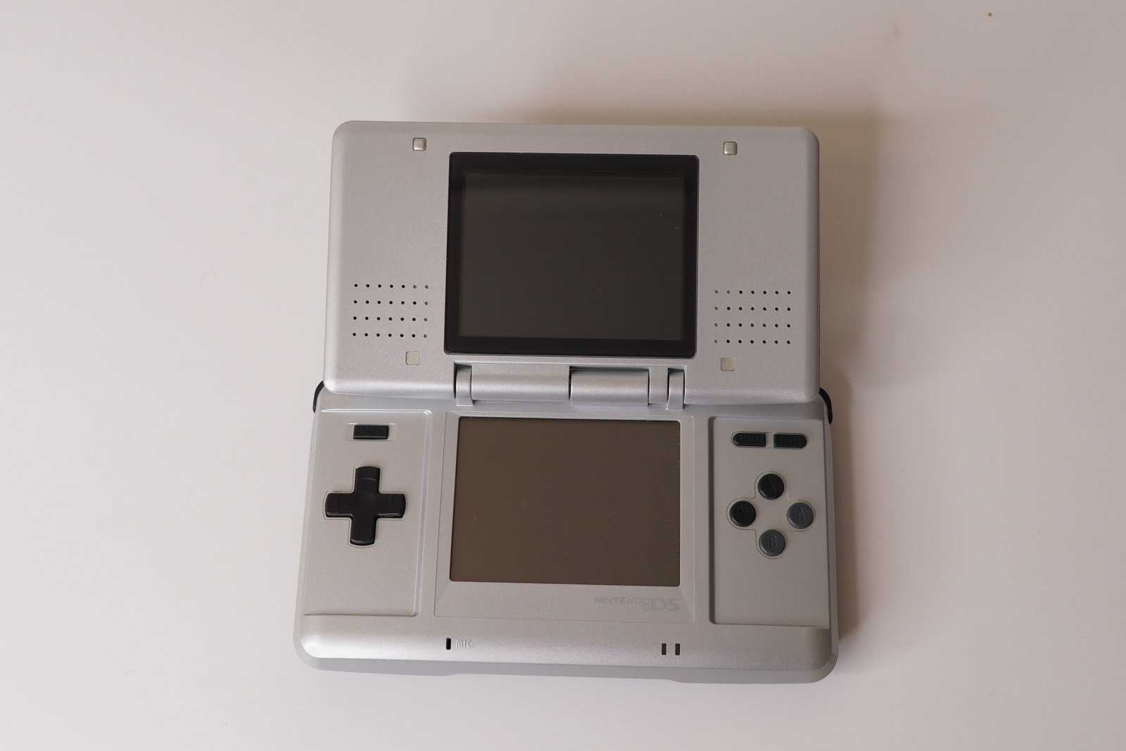 Original Nintendo DS - Excellent Condition: Works fine, did basic test, great condition with little signs of wear, charger not included, ships with UPS or USPS, will combine shipping.