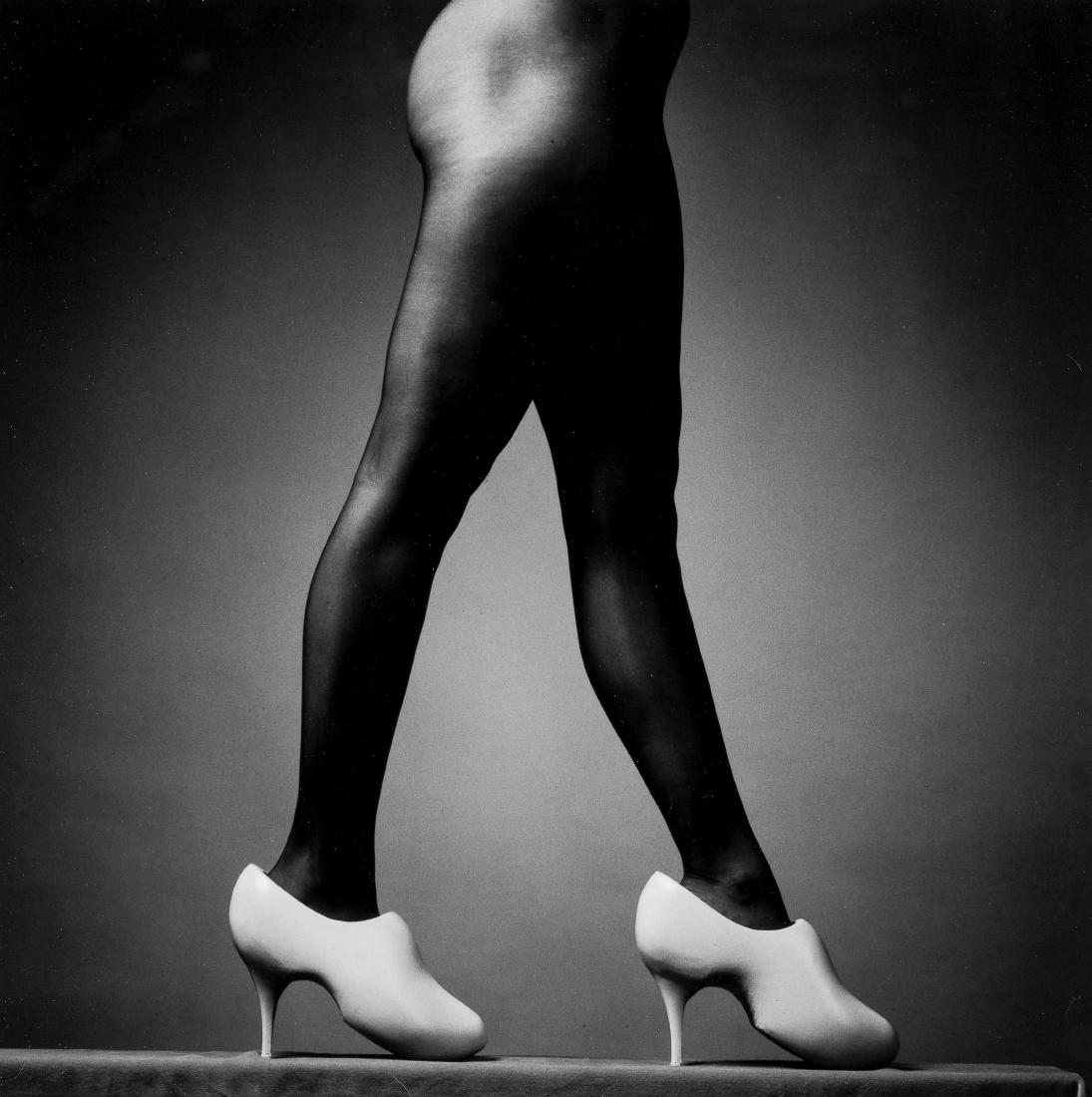 Erwin Olaf (Hilversum 1959): Erwin Olaf (Hilversum 1959) a) High Heels (Squares, 1985-1990) Signed, titled, date 1999 and numbered 1/15 on the reverse Gelatine silverprint, 21 x 21 cm (image size) / 24.5 x 24.5 cm (sheet size) b)