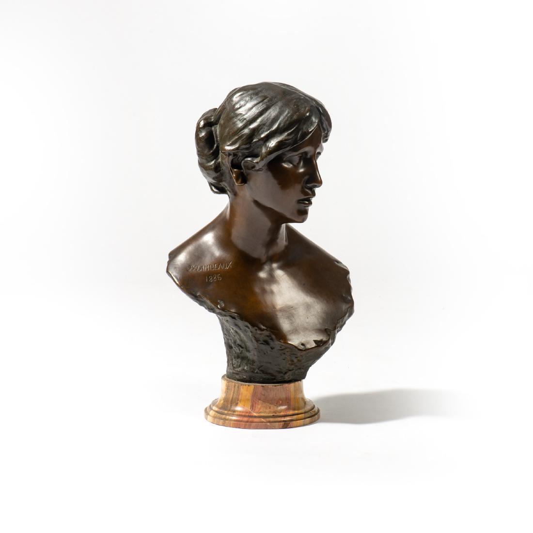 A bronze sculpture 'Buste de jeune femme au chignon' by: 1852-1908 Inscribed at the neck Jef Lambeaux 1885, her hair in a bun, on a marble base. H. 56.3 cm (incl. base) Provenance: Collection H.J. van Dam, Amsterdam