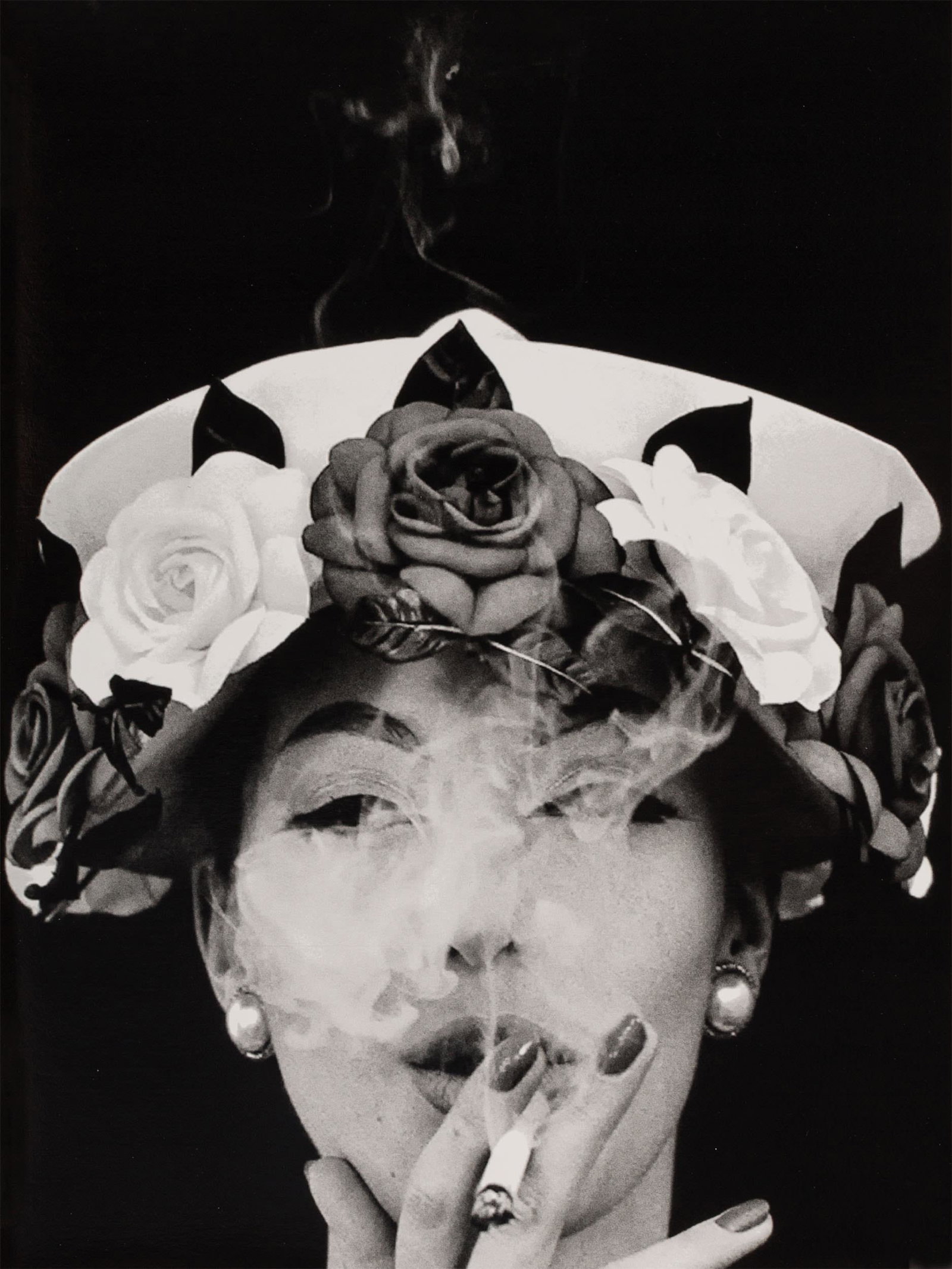 William Klein (New York City 1928): Hat + 5 Roses, Paris 1956 (Vogue)Signed and titled on the reversePrinted laterGelatin silver print, 40.3 x 30.1 cmLiterature & Exhibitions: - Vogue, Paris, May 1956, p. 58, as Chapeaux en Fleur- The H
