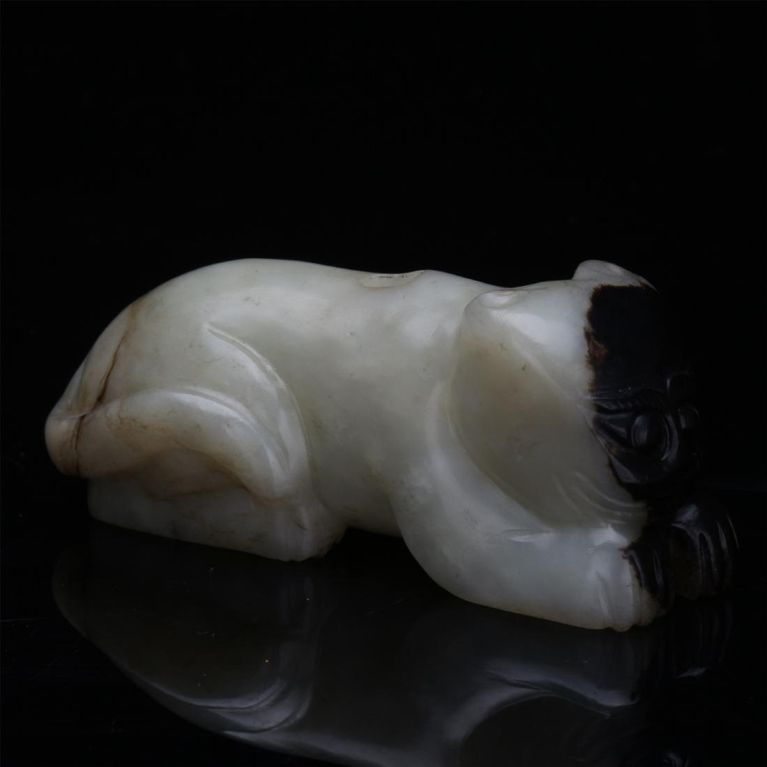 CHINESE JADE COUCHING BEAST: CHINESE JADE COUCHING BEAST. L. 7 cm. Local pickup in our NJ warehouse available. Shipping cost $30 to US 48 states and $100 for oversea delivery. Combined shipping available to save shipping cost. Do