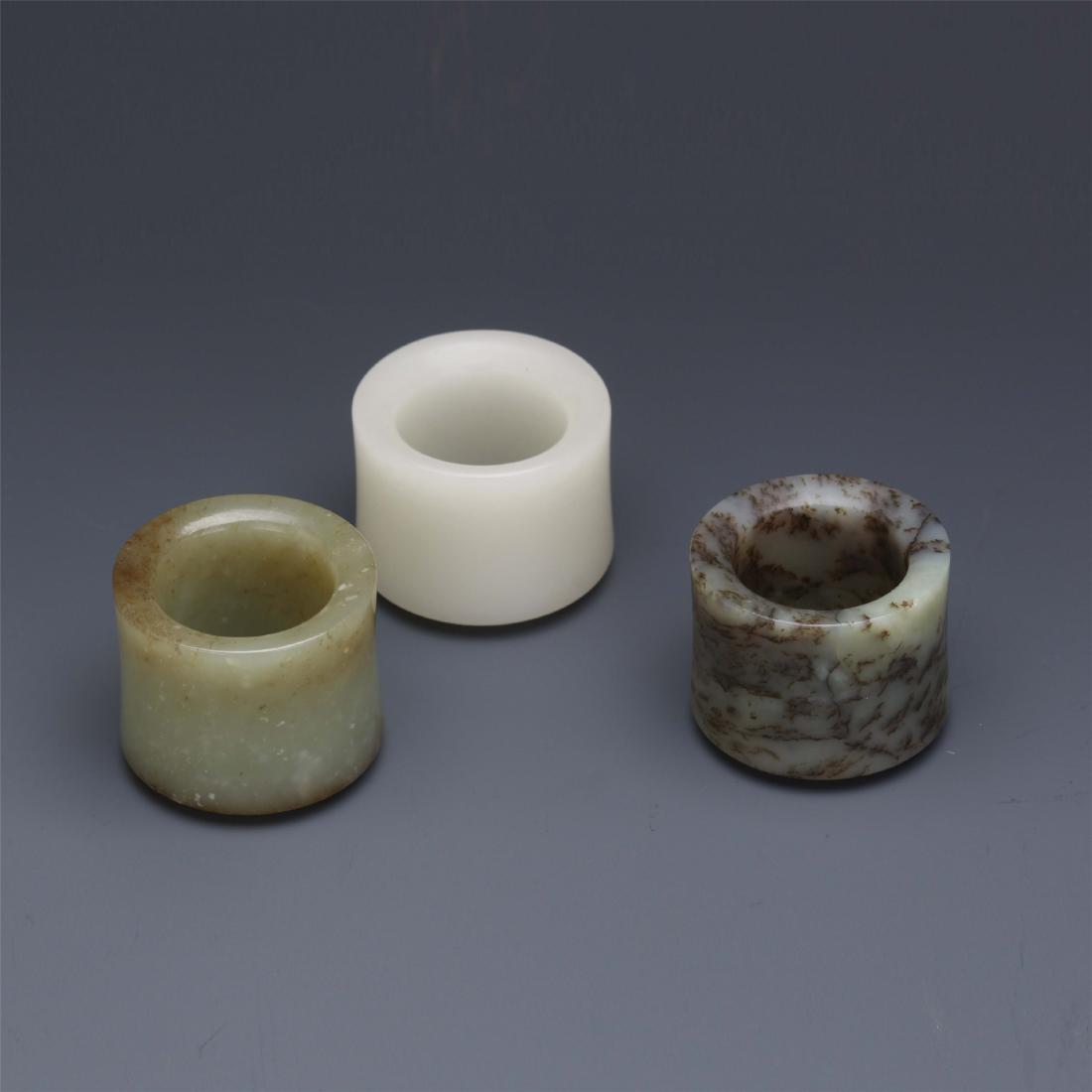 THREE  CHINESE NEPHRITE JADE ARCHER'S RINGS (1 of 8)