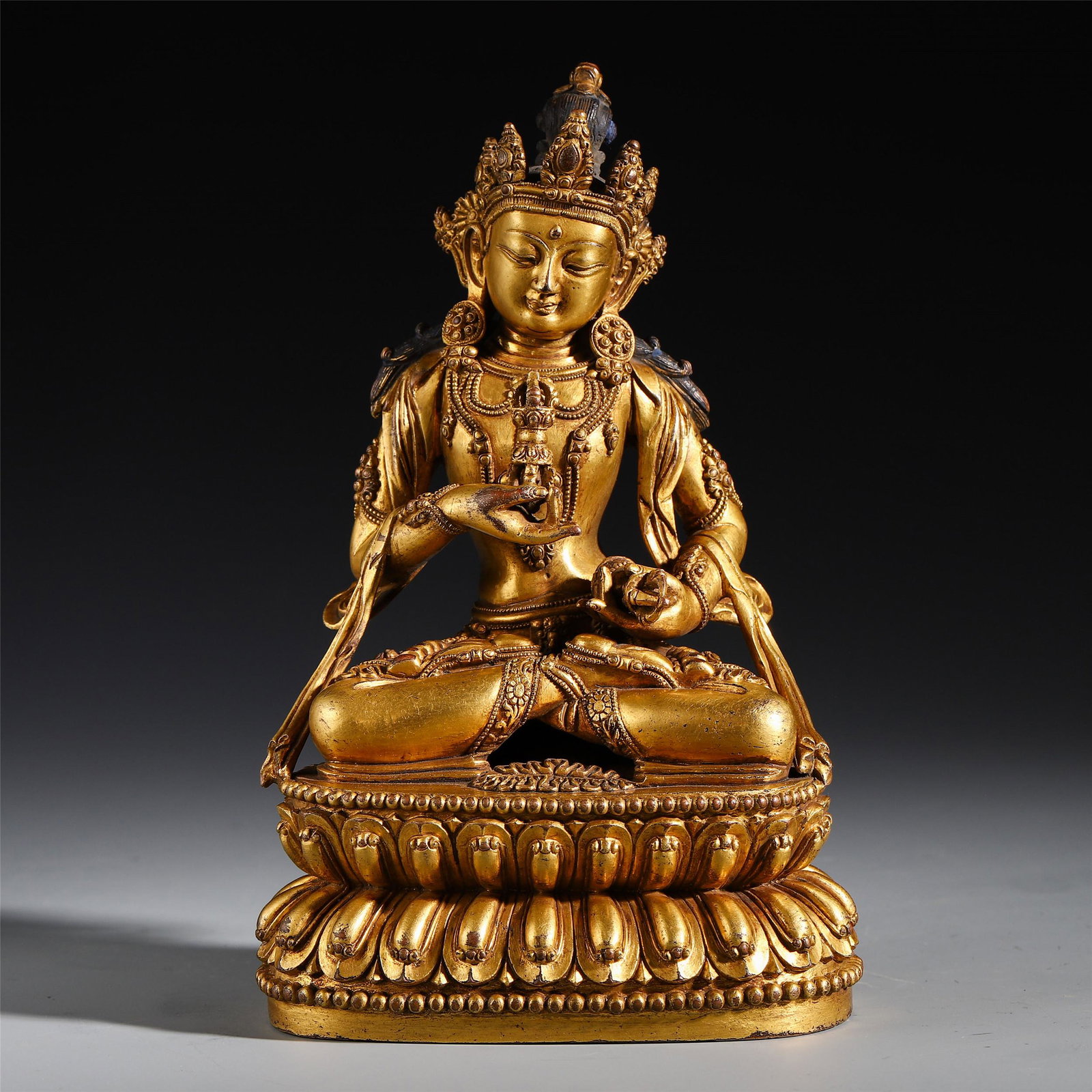 TIBETAN GILT BRONZE SEATED BUDDHA (1 of 9)