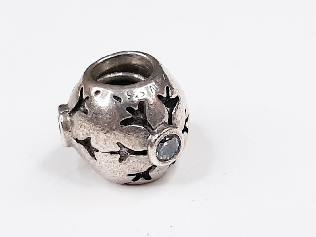 Sterling Silver Authentic Pandora Snowflake Charm: Sterling Silver Authentic Pandora Bracelet CharmWeight 3.8 GramsSize 3/8"Inch x 1/4"Inch