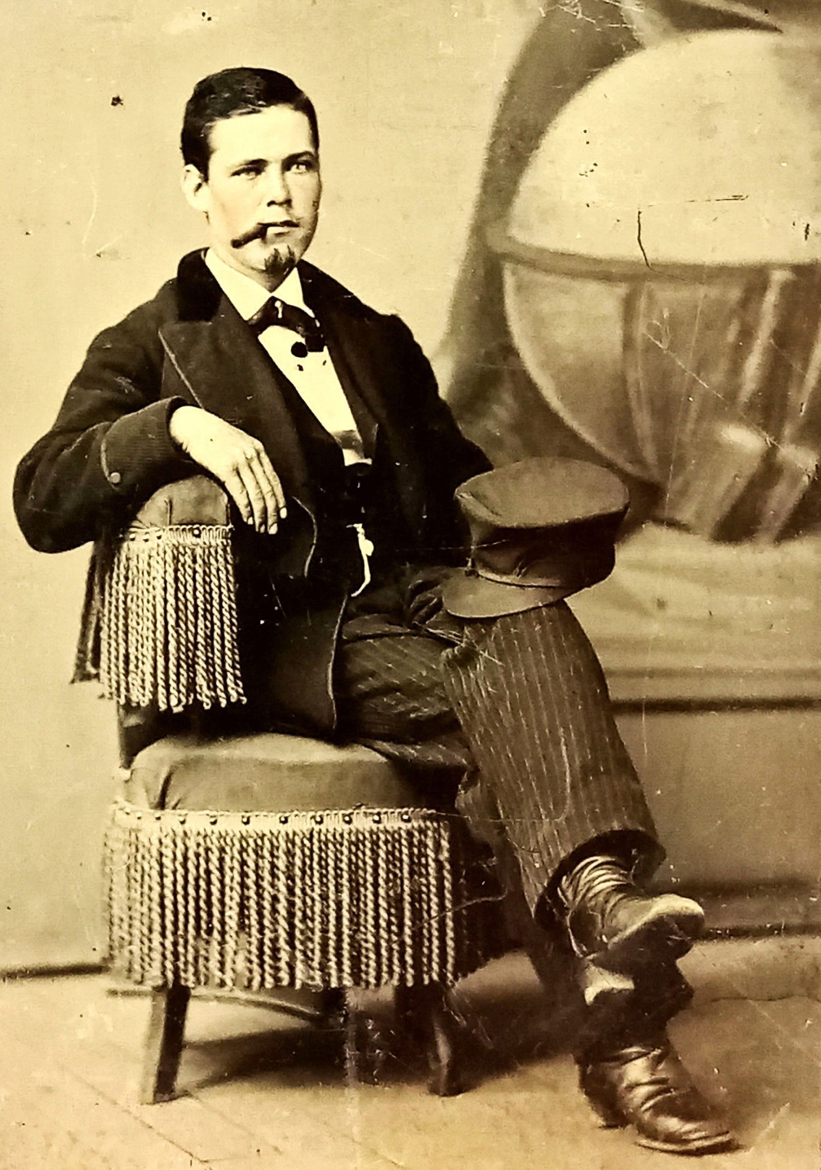 Tintype Photo Young Man Cigar Mouth Conductor Hat on Knee Painted Cheeks (1 of 3)