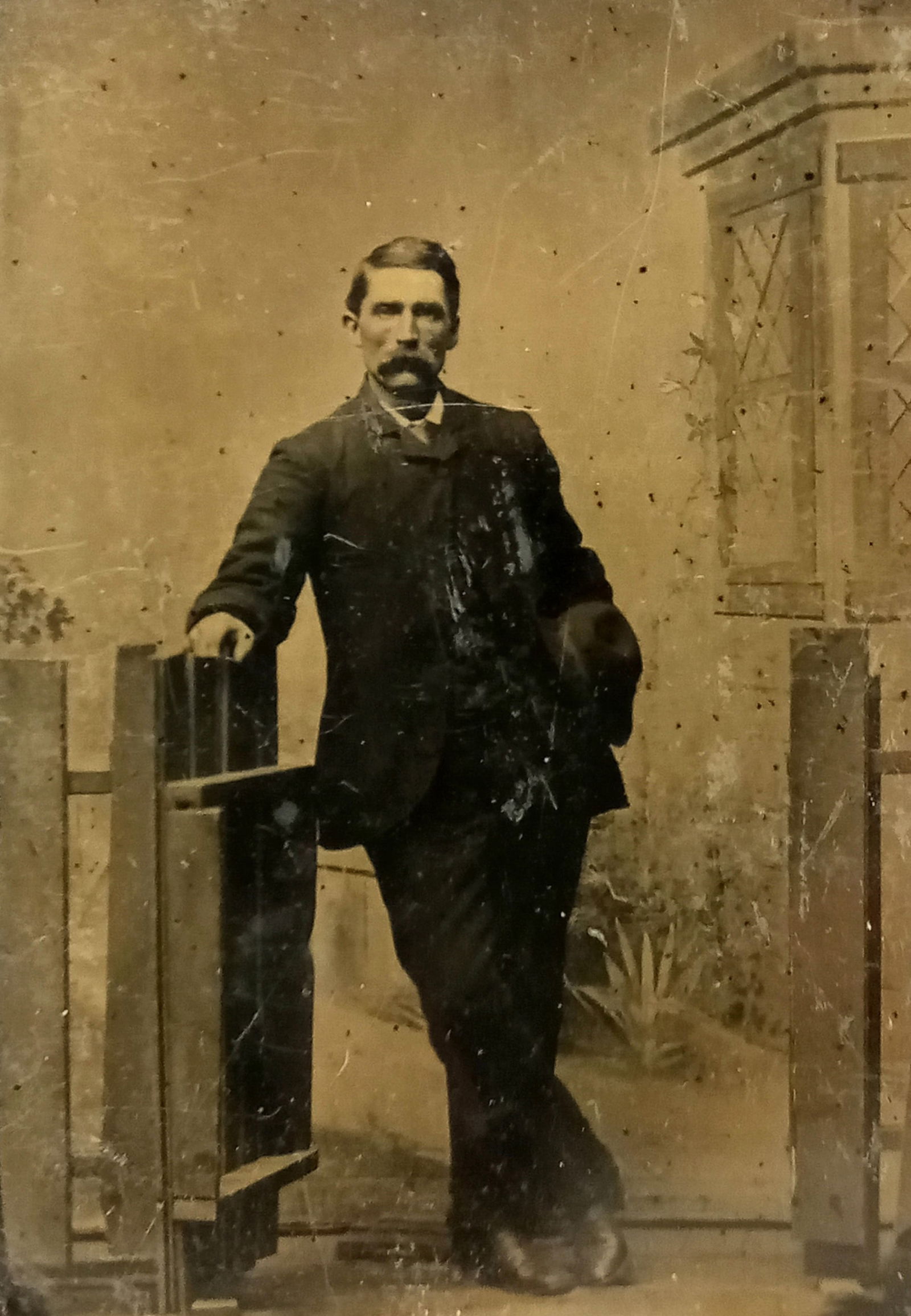 Tintype Photo Man leaning on mantle legs crossed (1 of 3)