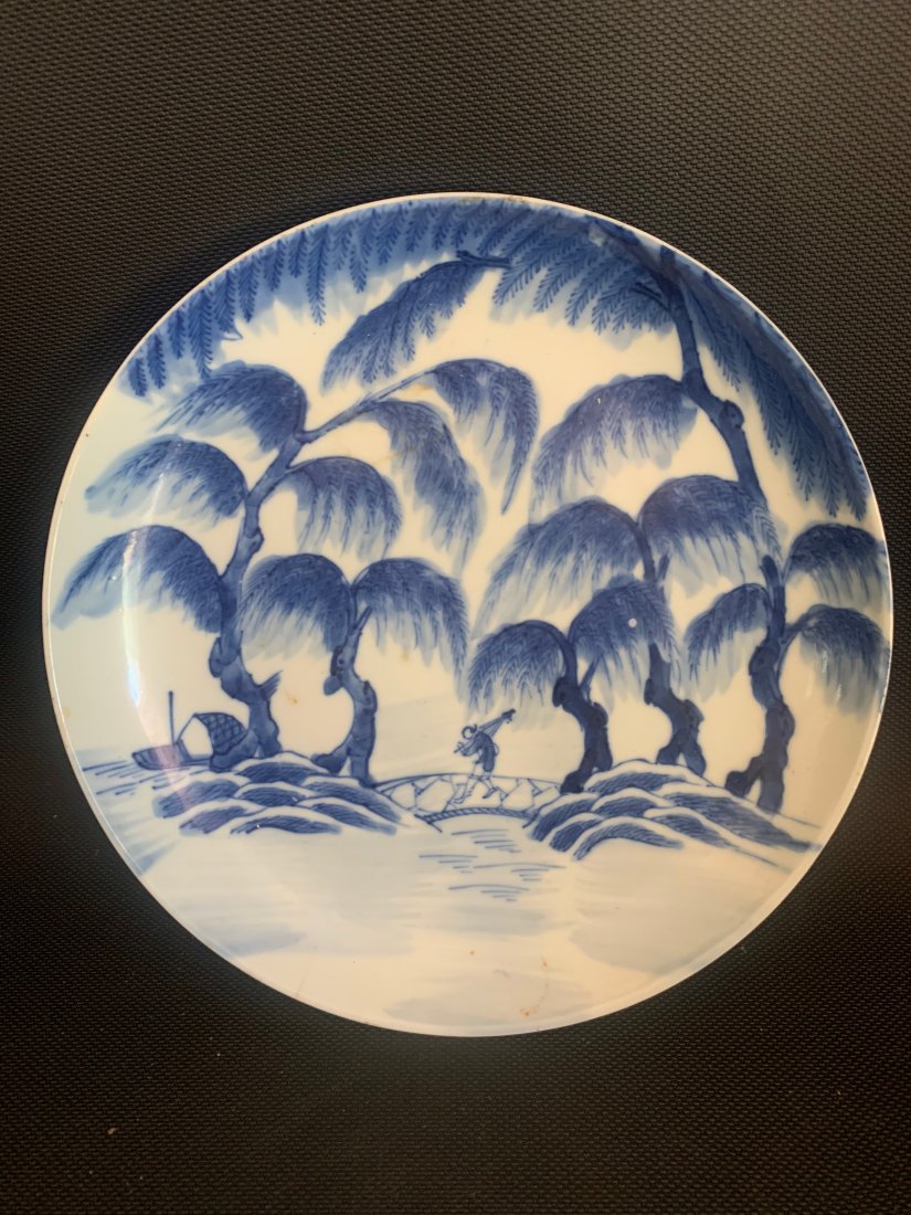 Sometsuke Tea Ceremony Plate, Edo Period: Edo Period Sometsuke plate with fisherman crossing bridge under willow trees returning to his boat. Makers mark to base. 7 inch diameter.