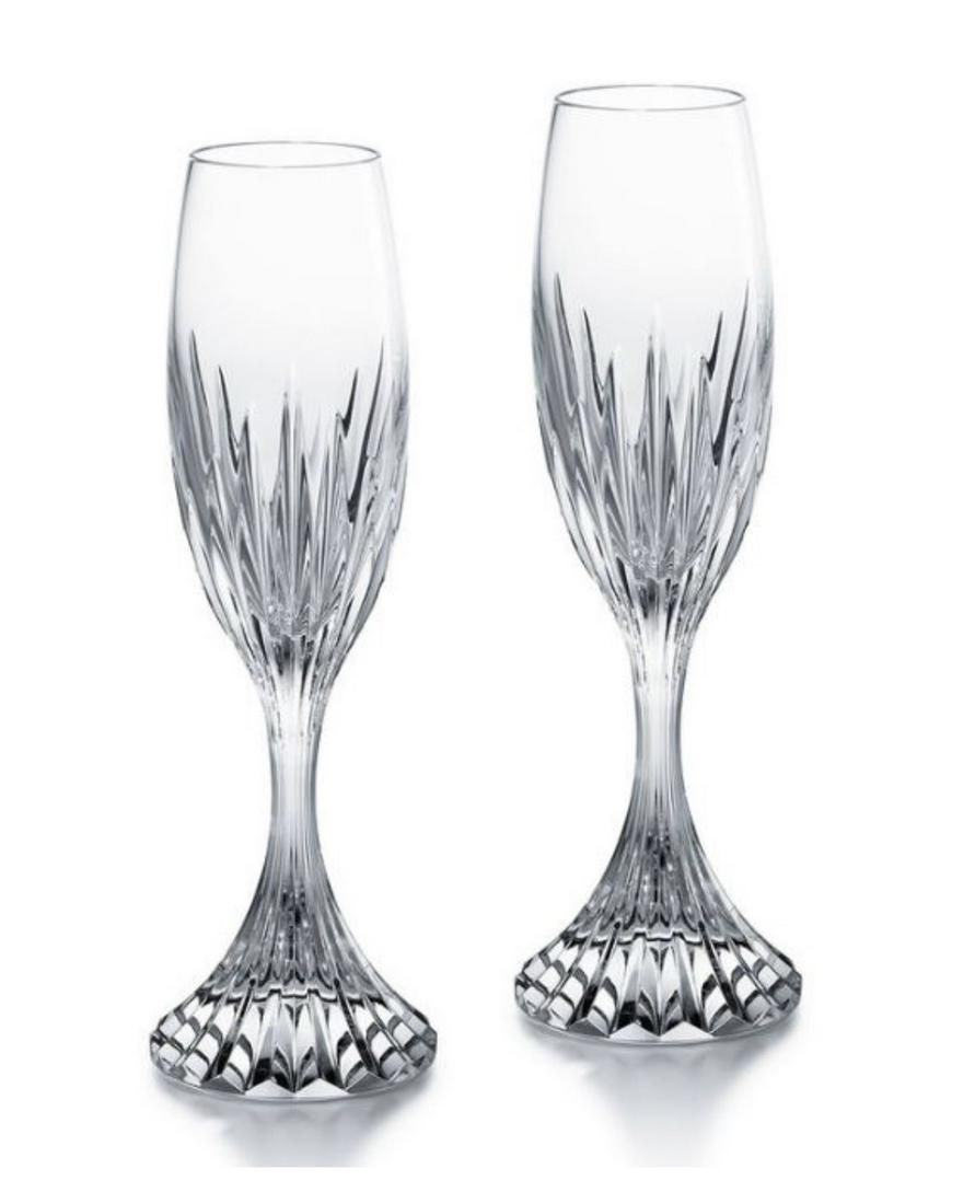 8 Pcs Baccarat Massena Champagne Flutes: These 8 Baccarat Champagne Flutes showcase Baccaratâ€™s meticulous craftsmanship. Deep orgue bevel cuts are etched directly into the Clear crystal, radiating from the foot of the glass to the bas
