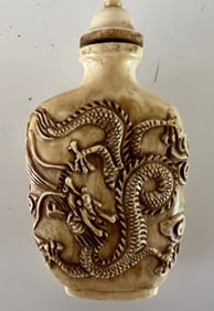 Qing Carved Snuff Bottle with Dragon and Phoenix